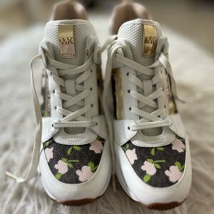 Michael Kors floral sneakers.